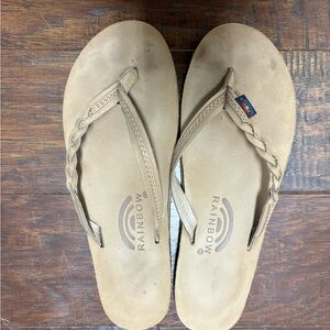 Rainbow flip flops size large. Tan color. Fits 7.5-8.5